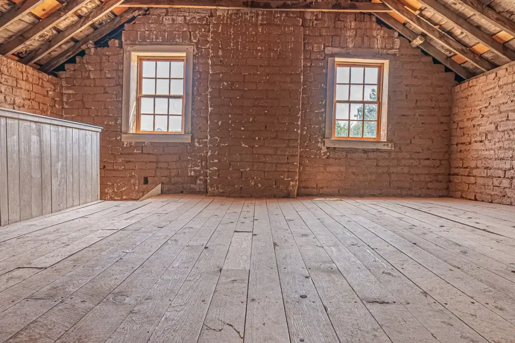 Open attic with exposed rafters ready for insulation