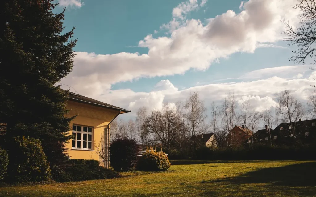 Country home with a wide lawn near Calhoun
