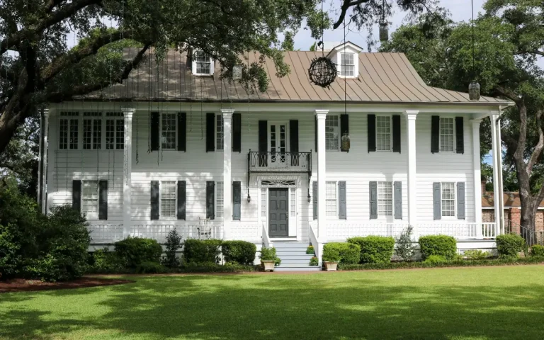 Historic white two-story home in Bastrop, LA