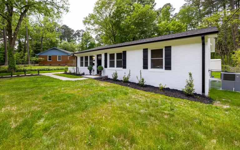 White ranch home among trees in Calhoun, LA